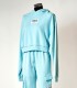 Felpa azzurra cropped Comme des Fuckdown – Streetwear donna