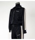 Palm Angels Tuta Nera con Zip e Bande Laterali – Stile Streetwear Iconico
